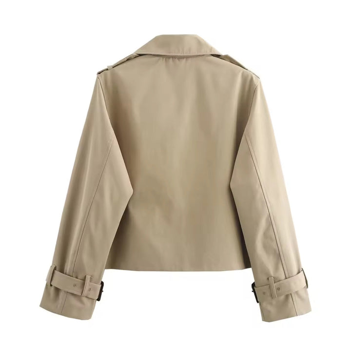 Model wearing a women's chic cropped trench coat, ideal for versatile everyday wear & fall fashion.