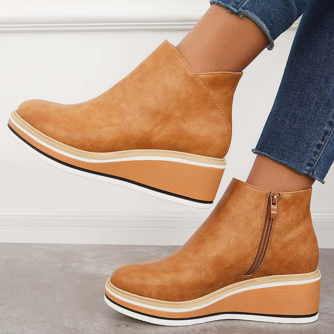 Stylish women's ankle boots with side zipper, offering orthopedic comfort & support.