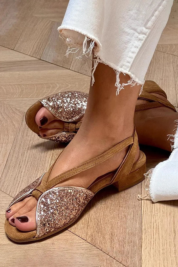 Elegant women's low heel strappy sandals in brown with sparkling glitter, perfect for comfortable summer casual footwear.