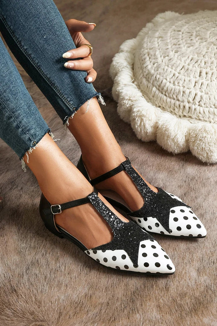 Women's elegant T-bar ballet flats with a stylish polka dot pattern. Comfortable & versatile fashion shoes.