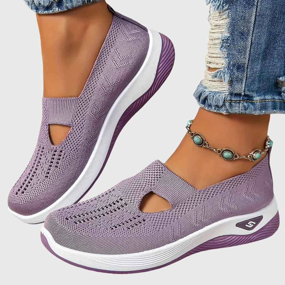 Supportive women's orthopaedic walking shoes, easy slip-on style for all-day comfort.