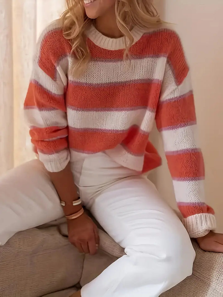 Comfortable women's blush stripe knit jumper, ideal for winter & spring fashion. Soft long-sleeve cozy top.