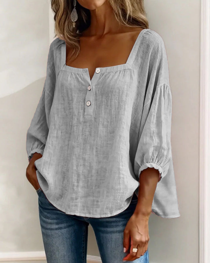 Everyday women's fashion top: relaxed fit, puff sleeves, and a classic square neck.