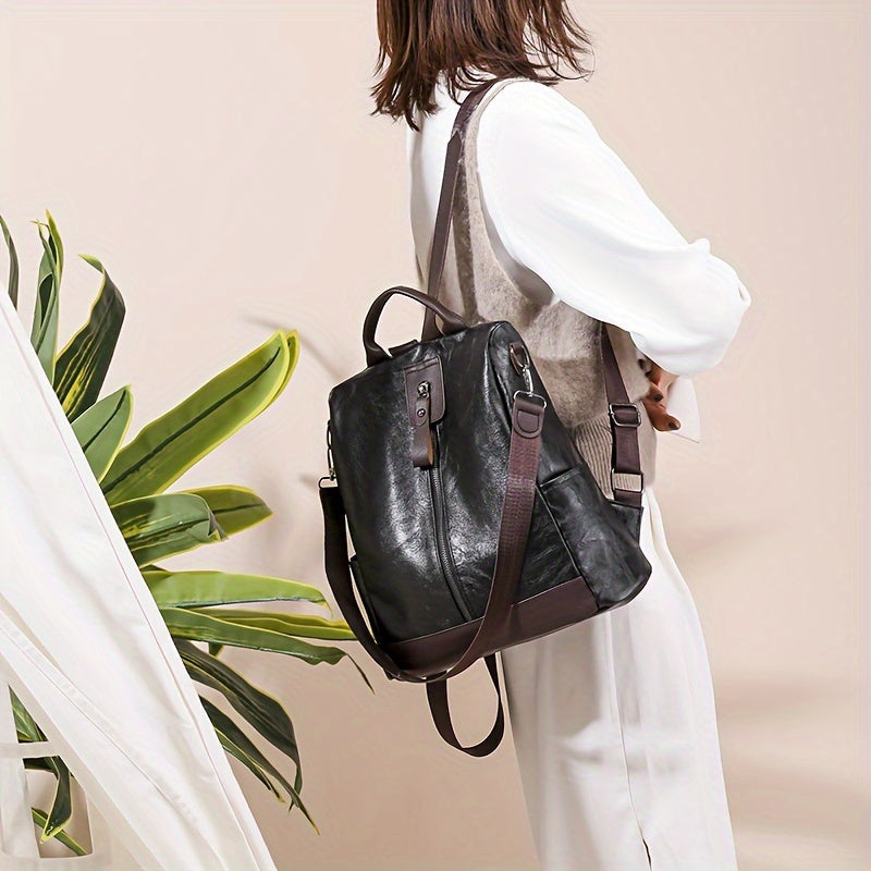 Elegant brown women's anti-theft backpack. Chic urban fashion security bag, perfect for stylish safety.