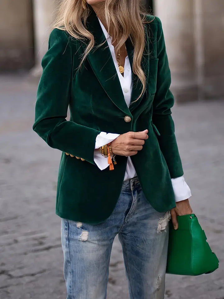 Stylish single-button tailored blazer for women, an elegant outerwear piece for professional settings.