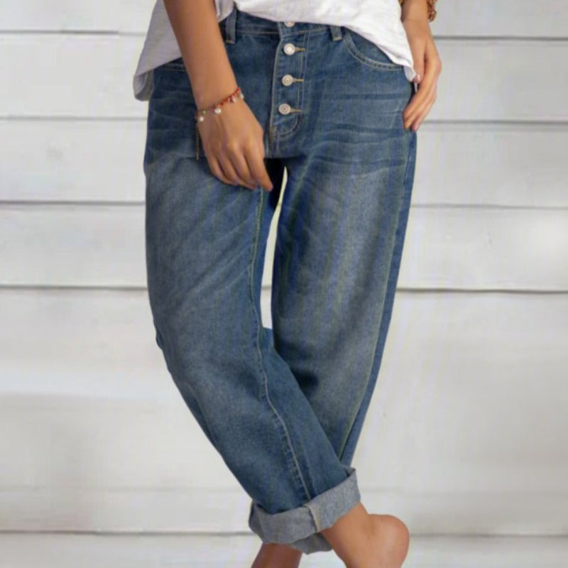 Blue women's relaxed fit boyfriend jeans for everyday comfort. Stylish loose denim for casual wear.