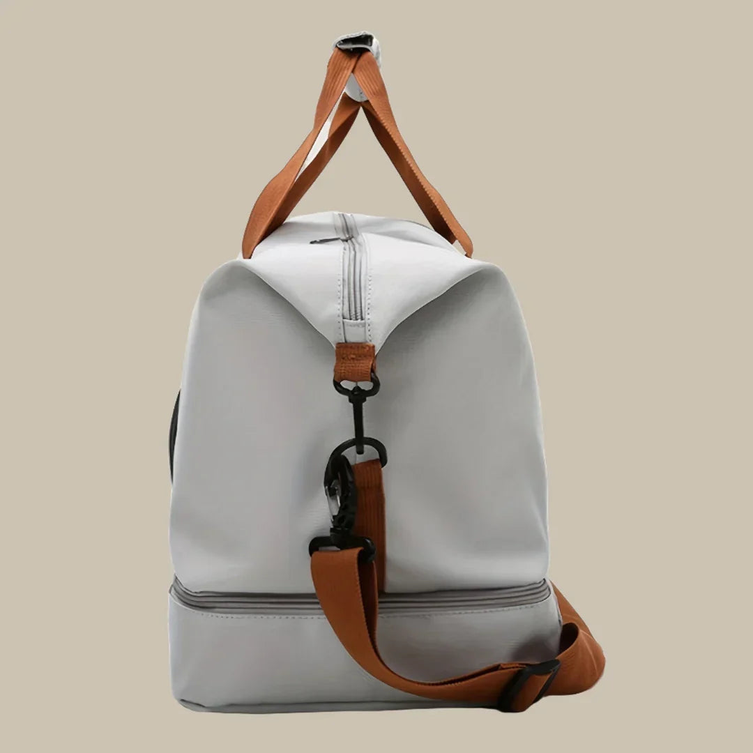 Men's stylish shoulder duffel bag for travel, featuring a comfortable strap & generous main compartment.