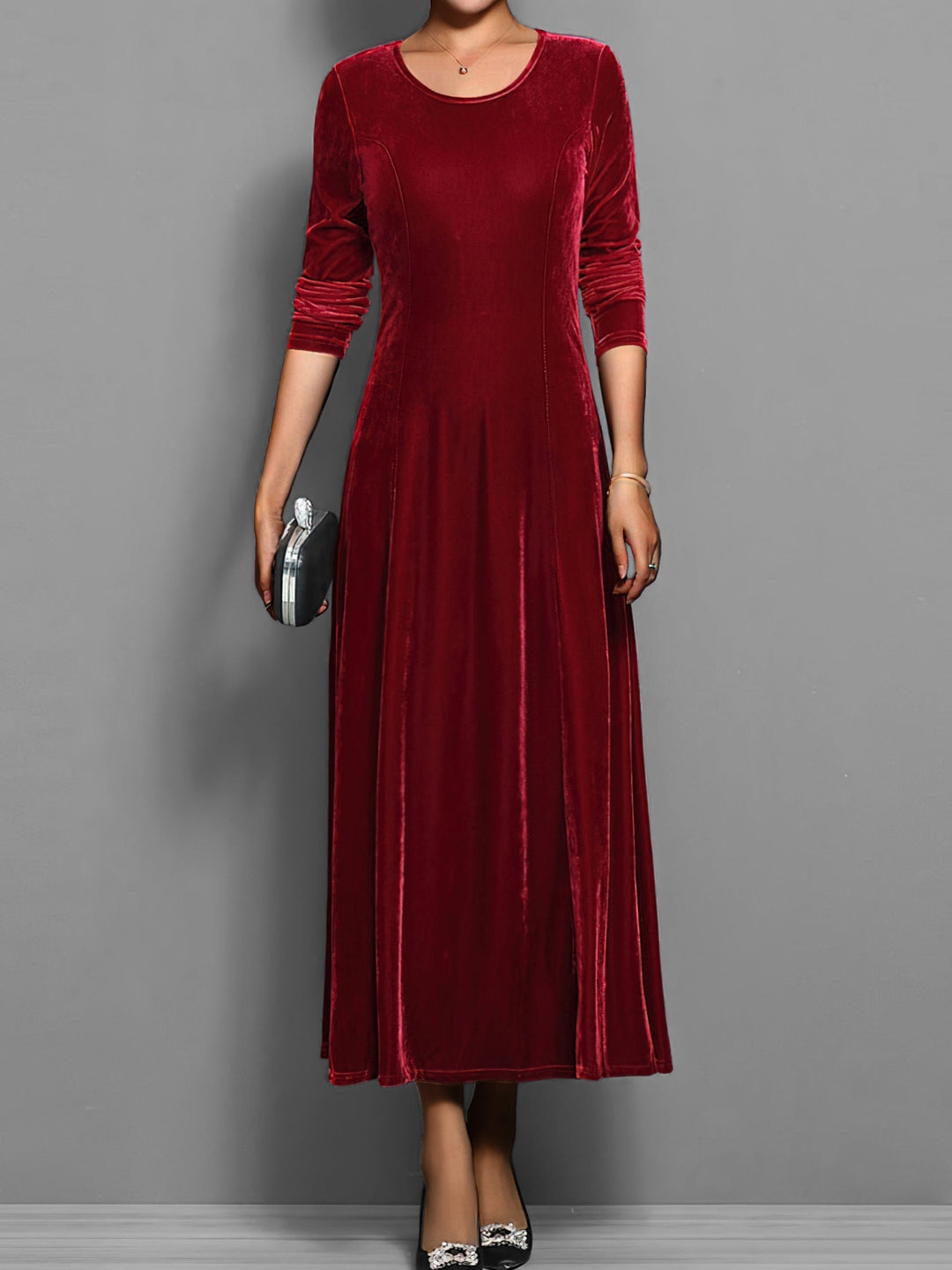Stylish women's full-length flared maxi dress, an elegant long sleeve design suitable for spring events.