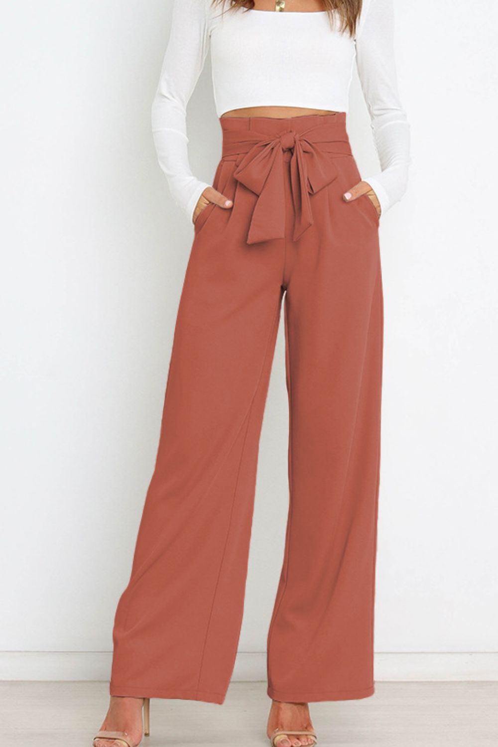 Women's casual chic high waist paperbag pants, with a flattering wide leg and bow.