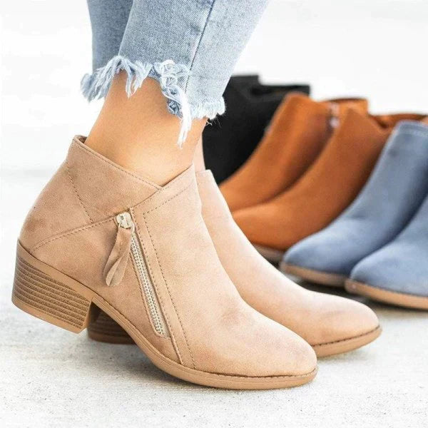 Durable women's comfortable ankle boots, perfect slip-on footwear for autumn & winter activities.