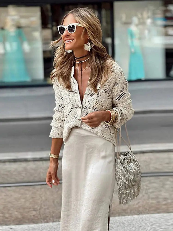 Women's versatile apricot crocheted cardigan, perfect for relaxed summer style. Elegant lightweight layering top.