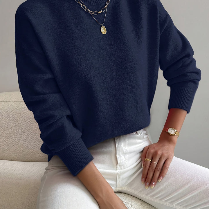 Warm & cozy high neck long sleeve knitted jumper for ladies' winter style.