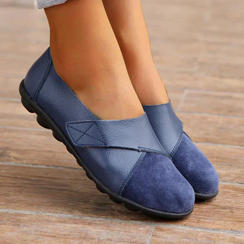Everyday casual footwear: unisex flat slip shoes with unique stitched paneled design, round toe.