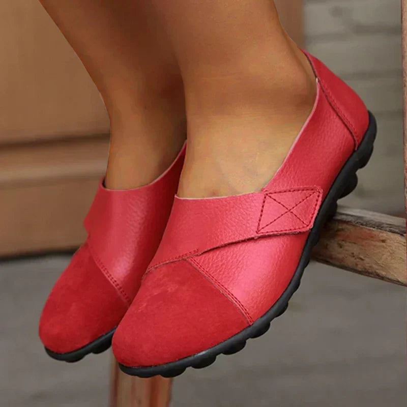 Unisex round toe flat shoes, excellent for walking, featuring comfortable slip-on style and paneled stitching.