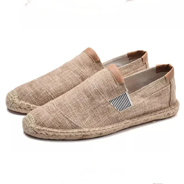 Stylish men's espadrille shoes with a soft canvas upper and classic jute sole. Summer slip-on comfort.