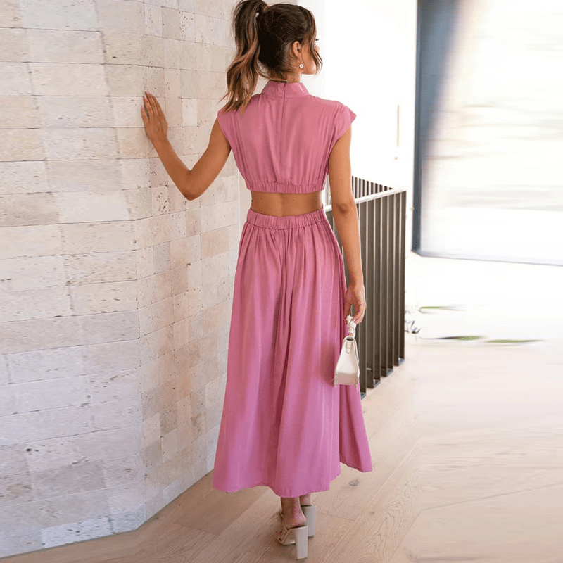 Sleeveless pleated summer midi dress for women. Elegant, flowy, and perfect for warm-weather occasions.