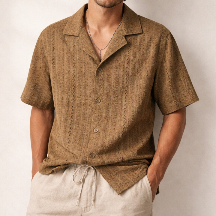 Men's textured short sleeve shirt with open collar. Lightweight, relaxed fit, perfect stylish summer button-up top.