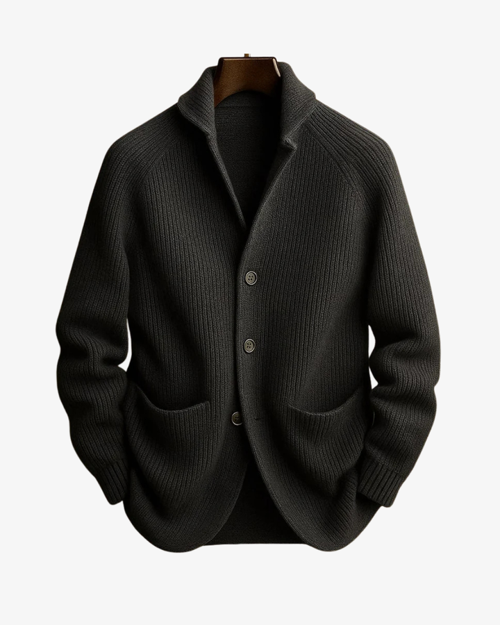 Elegant navy blue men's cardigan with tailored fit and classic button-front closure for refined style.