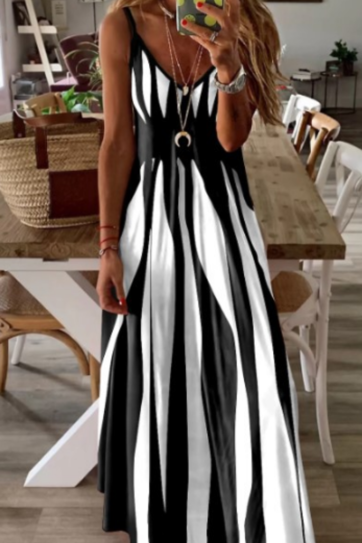 Women's flowy V-neck midi dress, perfect for summer casual comfort and effortless style.