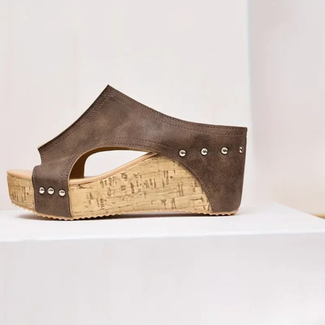 Lightweight women's comfortable wedge sandals with orthopedic support & stylish open-toe design for summer.