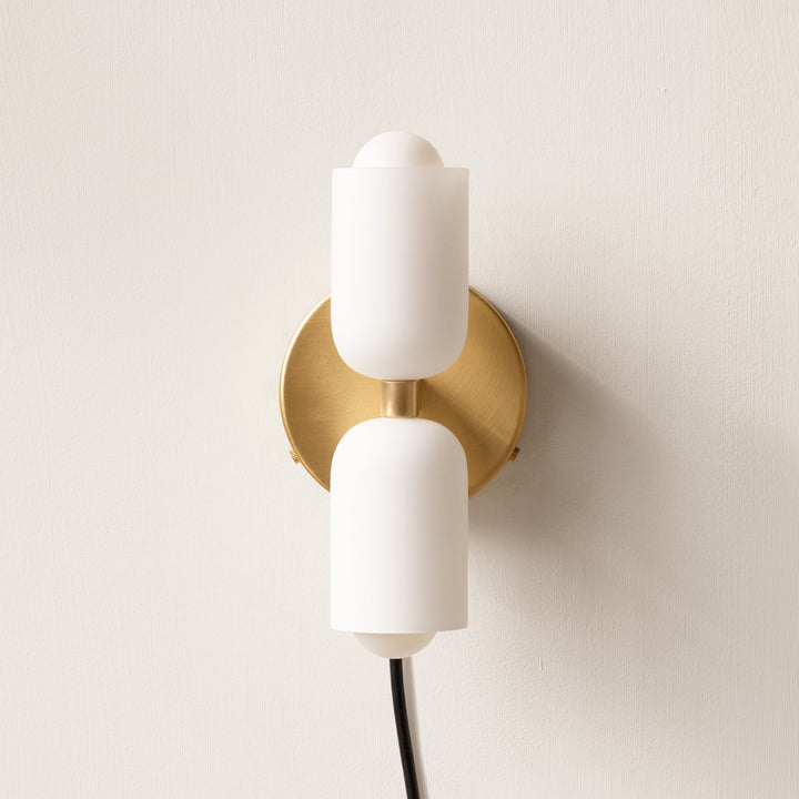 Sleek modern wall light, uplight/downlight design, perfect for ambient interior spaces.