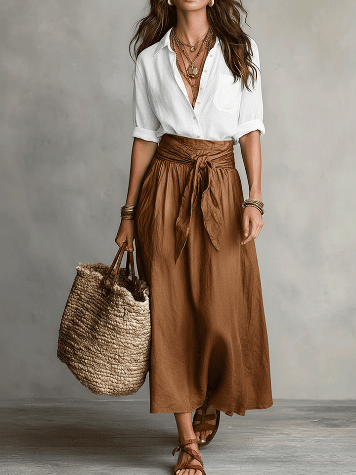 Vacation-ready women's Bohemian two-piece set with flowy skirt and stylish top for sunny days.