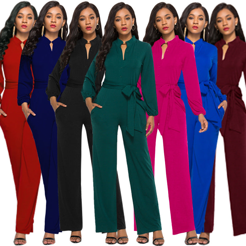 Women's elegant tailored jumpsuit with long sleeves, perfect for formal or party wear.
