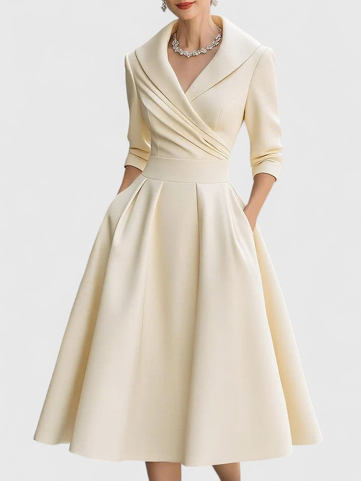 Stylish women's short sleeve pleated midi dress with wrap bodice, a versatile formal & party dress.