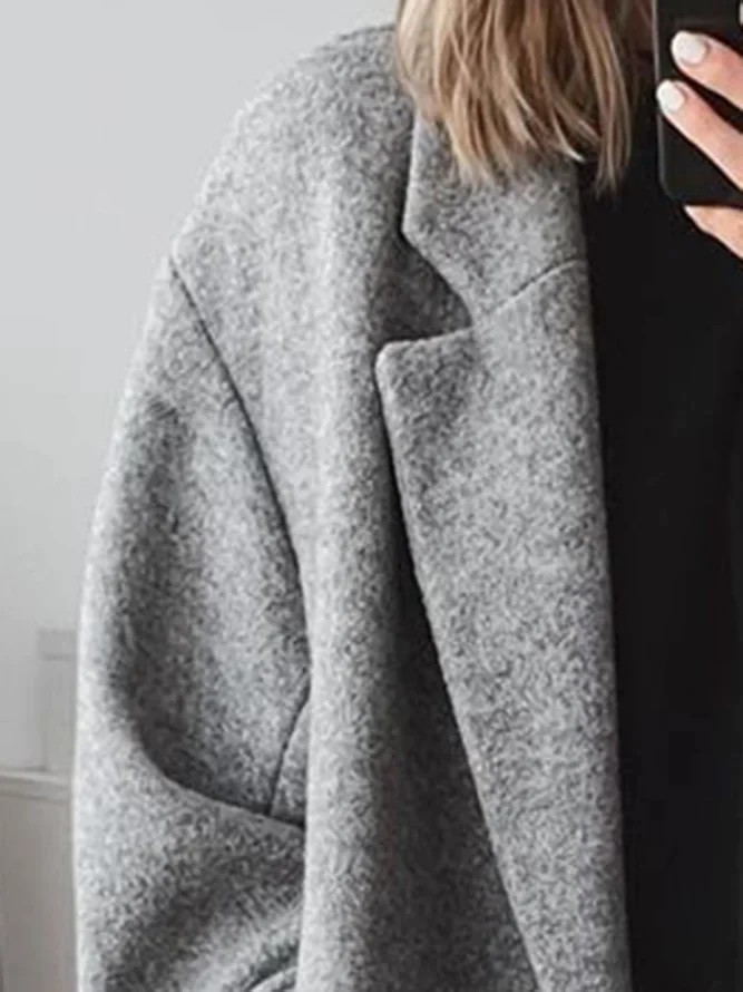 Elegant women's tailored overcoat, a classic long coat for sophisticated autumn & winter style and ladies' fashion.