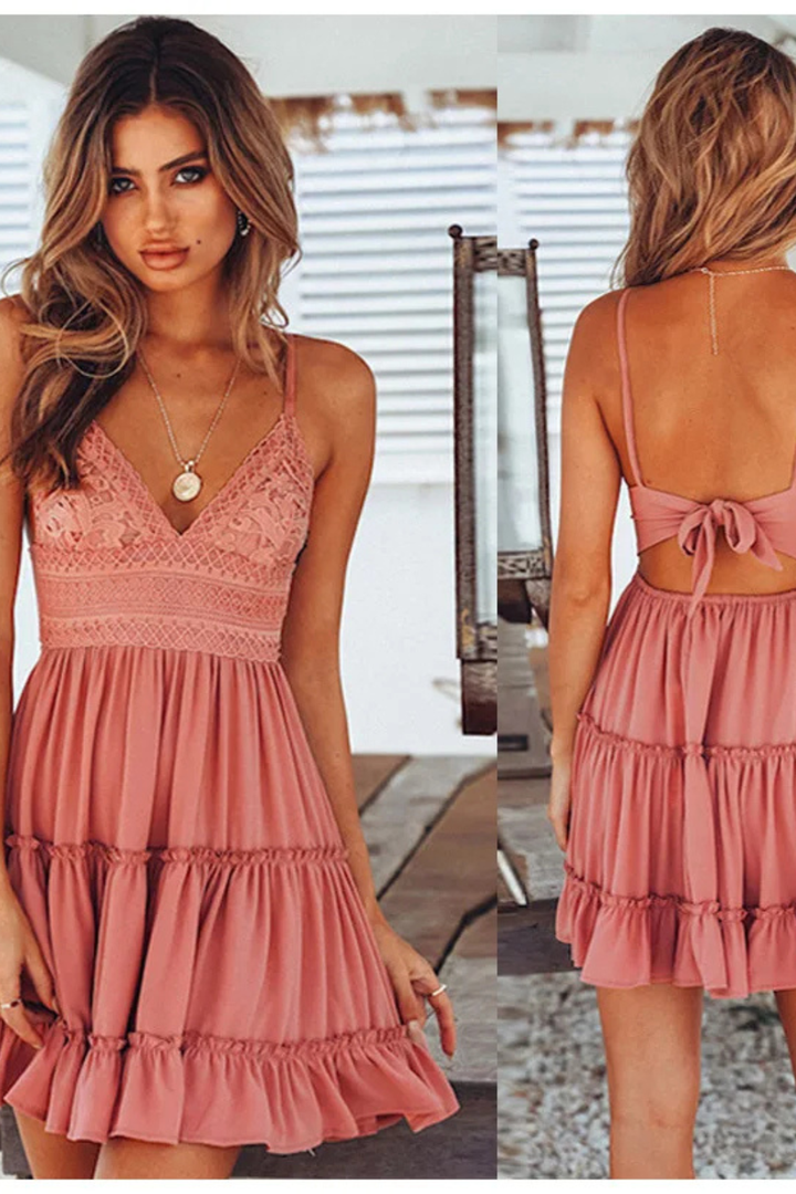 Versatile women's spaghetti strap mini sundress with open back, perfect for hot summer days.