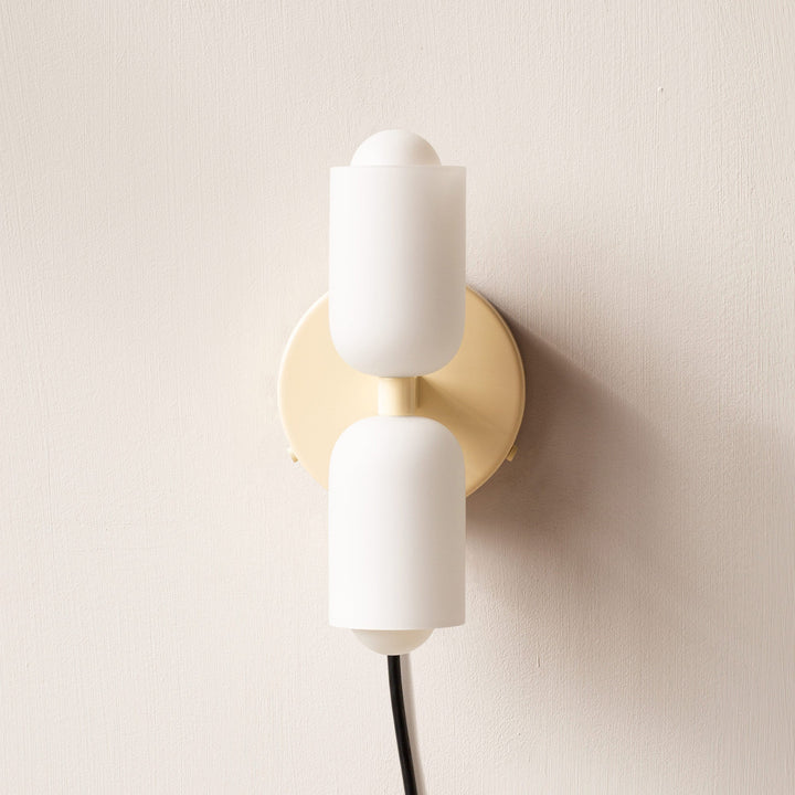 Decorative LED wall lamp, uplight & downlight, creating soft ambient home lighting.