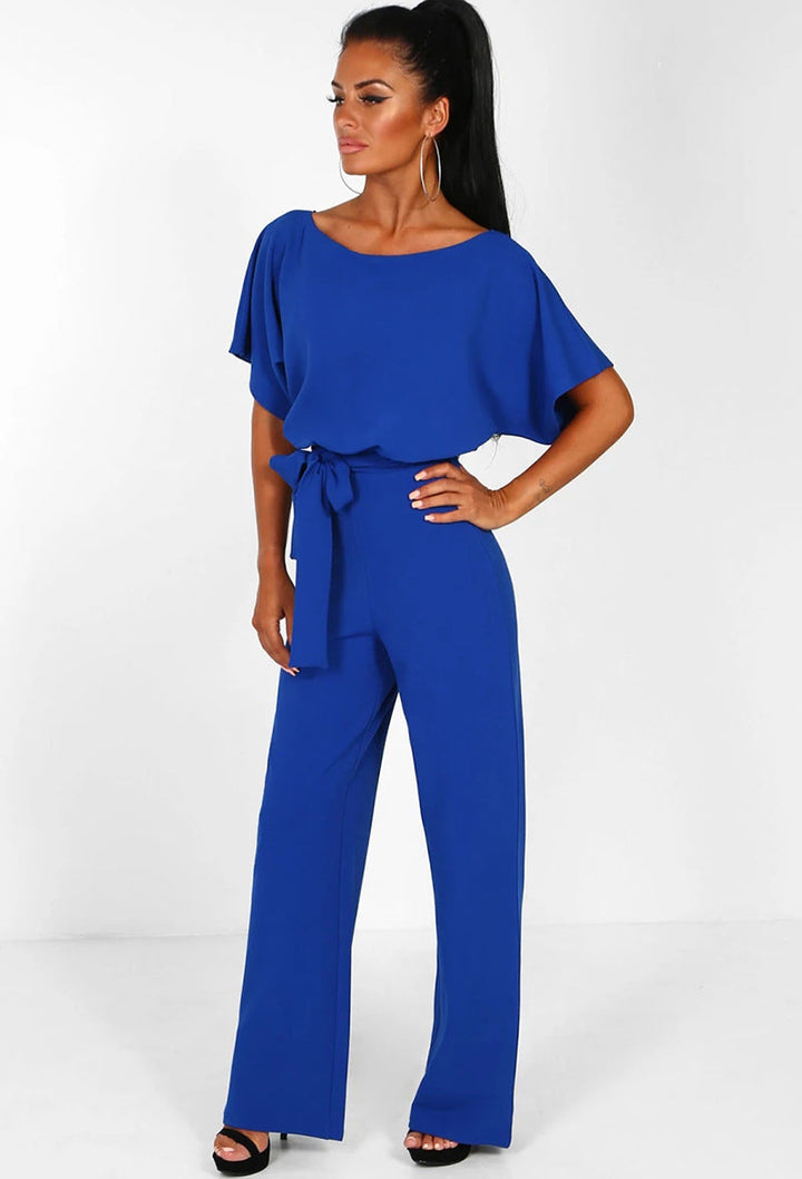 Sophisticated women's wide-leg jumpsuit with an elegant tied waist, a versatile and comfortable fashion piece.