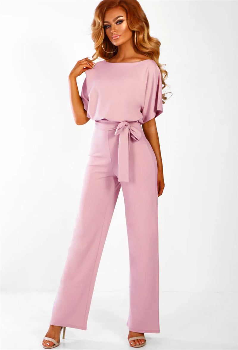 Womens elegant wide-leg jumpsuit, perfect for party wear or a stylish casual chic outfit. Features a tied waist.