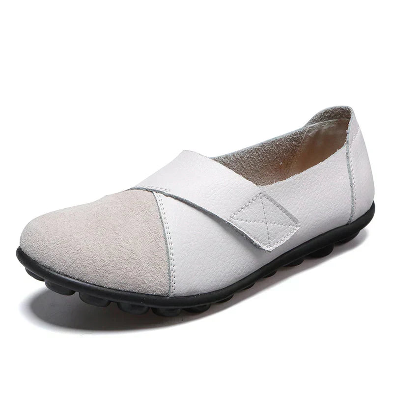 Unisex everyday flats with round toe, stitched panels & easy slip-on design for ultimate comfort.