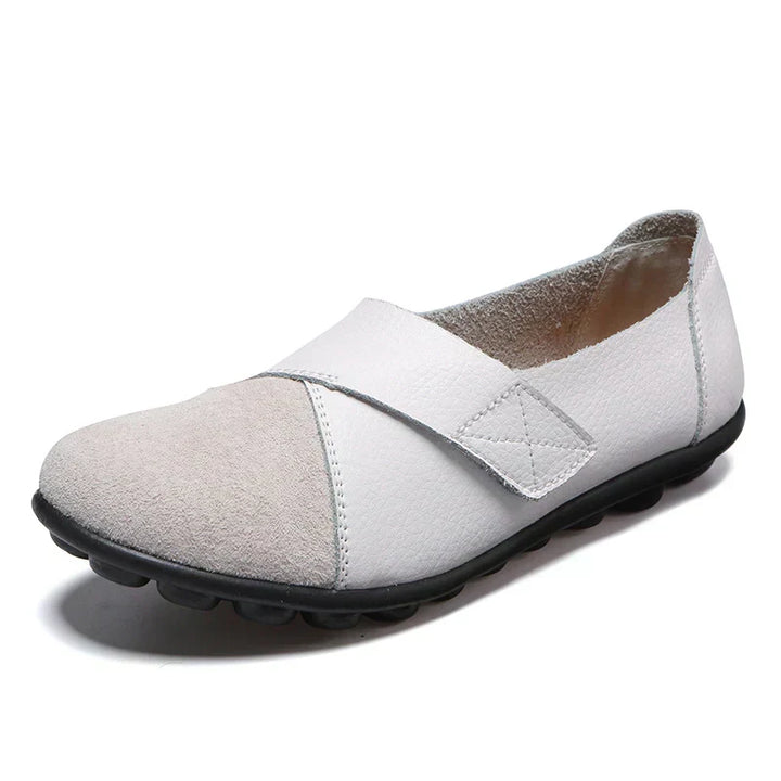 Unisex everyday flats with round toe, stitched panels & easy slip-on design for ultimate comfort.