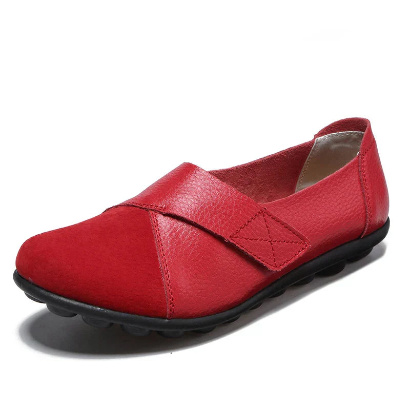 Practical unisex walking shoes, flat, slip-on, with a comfortable round toe and stitched panels.