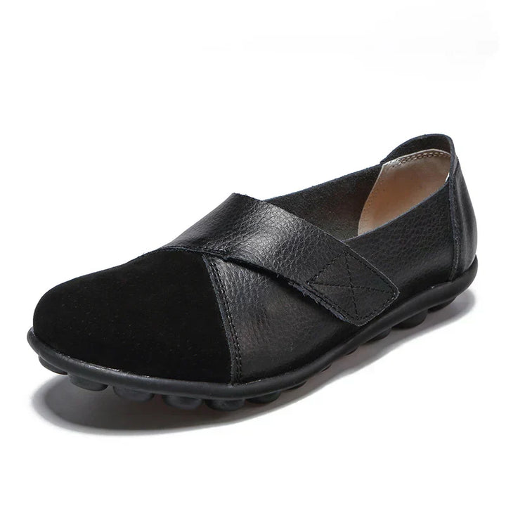 Chic unisex slip-on flats, round toe, stitched panels, ideal casual footwear for walking.