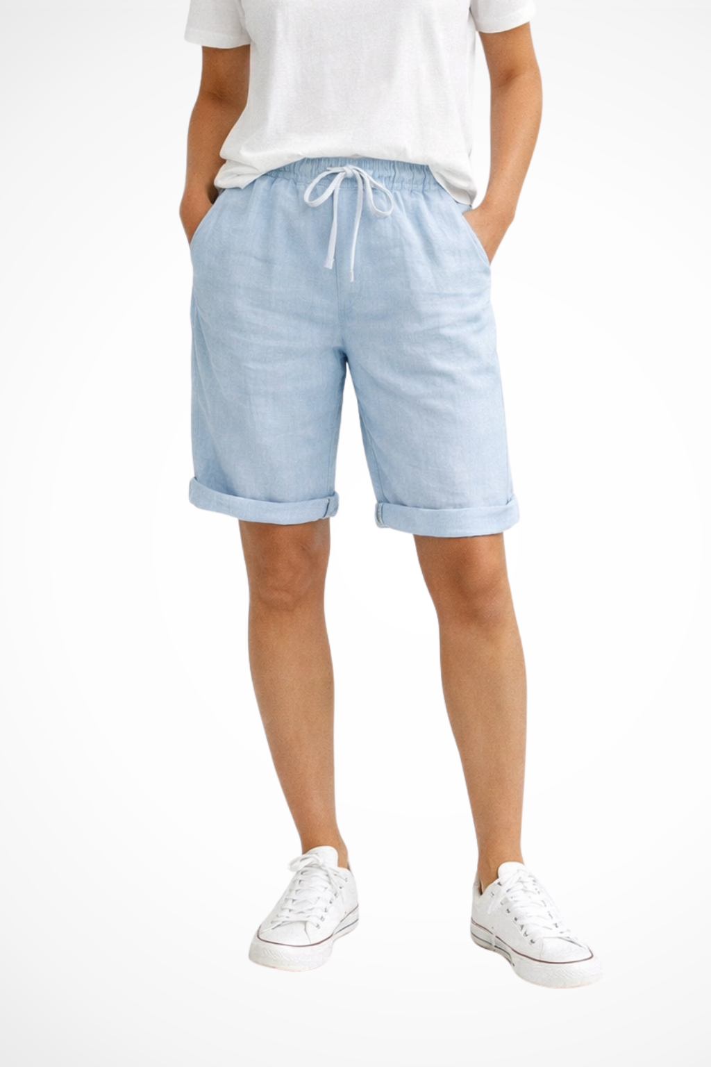 Comfortable women's relaxed fit capri trousers with drawstring waist & pockets, great for beach or casual travel.