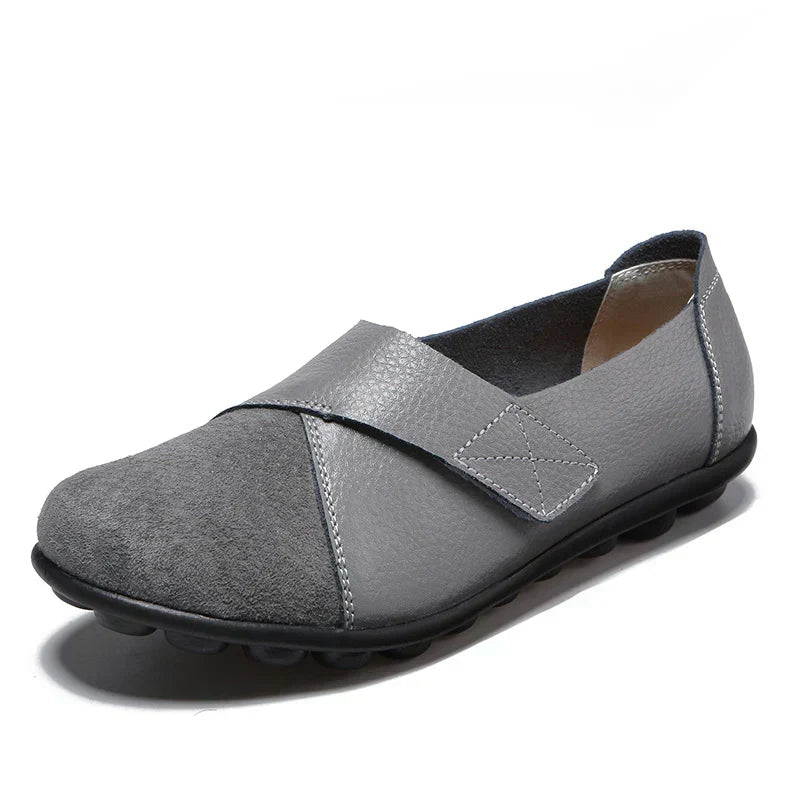 Durable unisex flat shoes, round toe, stitched paneled for unique style, easy slip-on comfort.