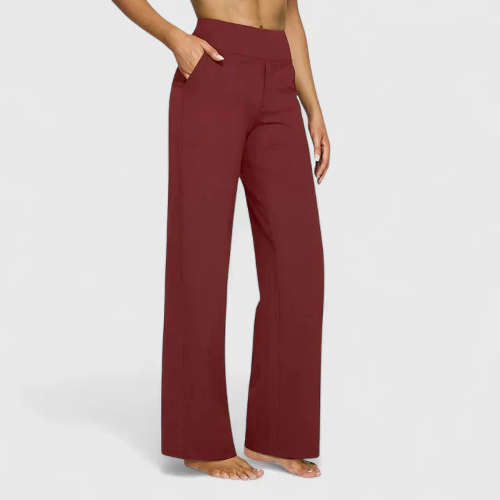 Close-up of practical pockets on stylish women's elegant straight leg trousers.