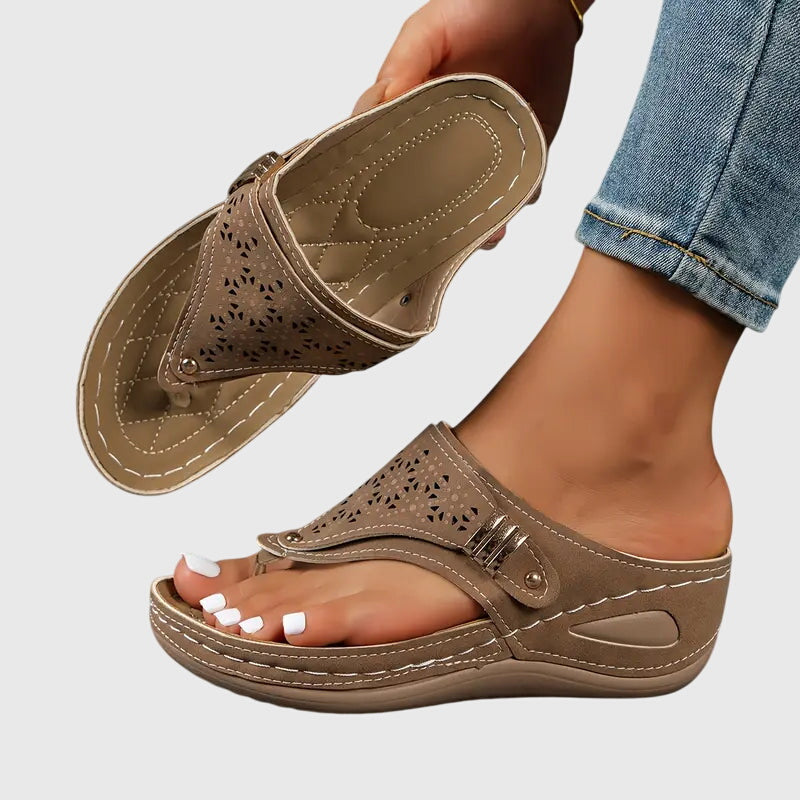 Women's orthopaedic comfort sandals with arch support for effective foot pain relief.