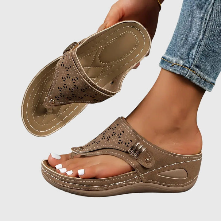 Women's orthopaedic comfort sandals with arch support for effective foot pain relief.