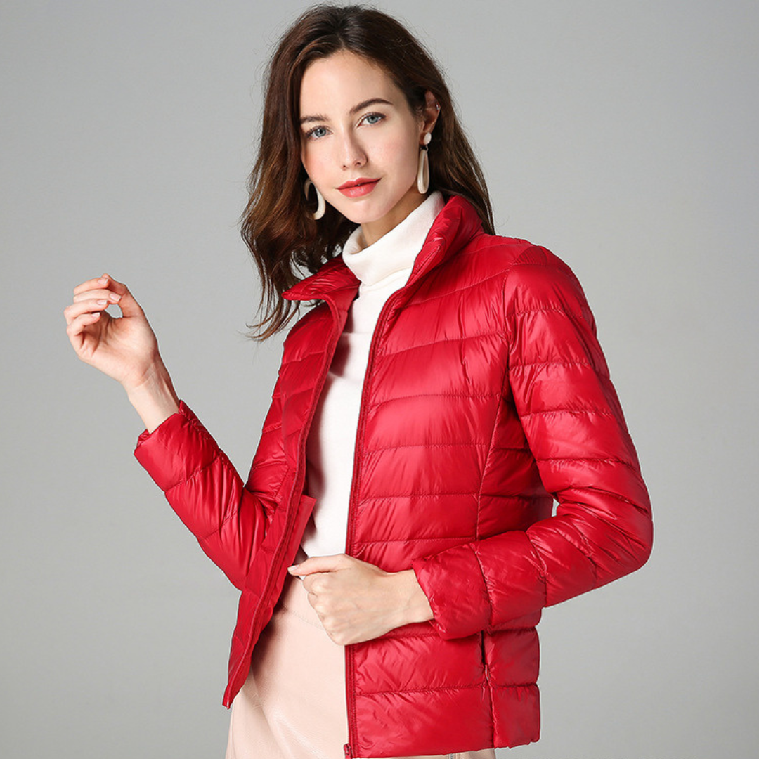 Simple, stylish women's ultralight waterproof jacket. Versatile all-weather protection for outdoor & everyday use.