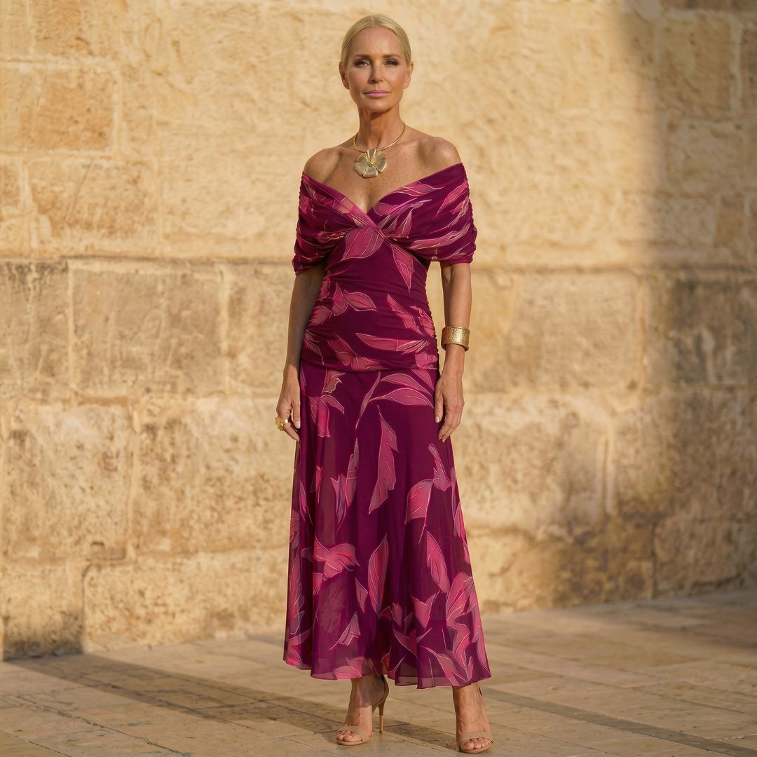 Elegant Women's purple leaf print midi dress. Effortless style, flowing fabric, perfect for day, evening, or special occasions.