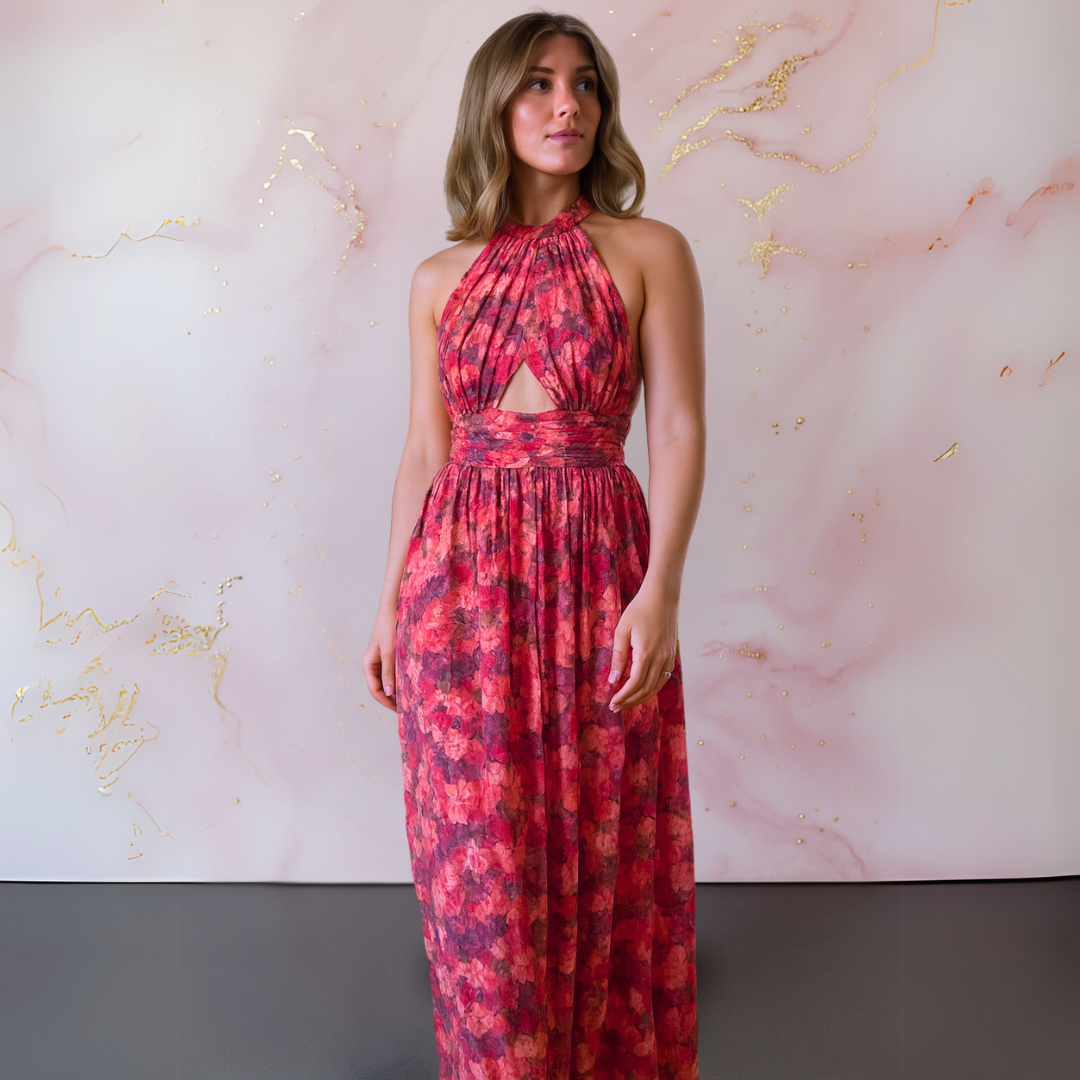 Women's red halter maxi dress featuring a stylish front slit, ideal for elegant party wear or summer events.