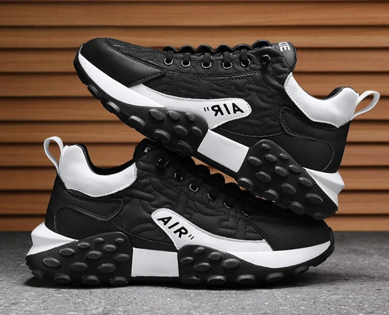 Urban men's platform sneakers with a thick chunky sole. Fashionable and comfortable street style trainers for men.