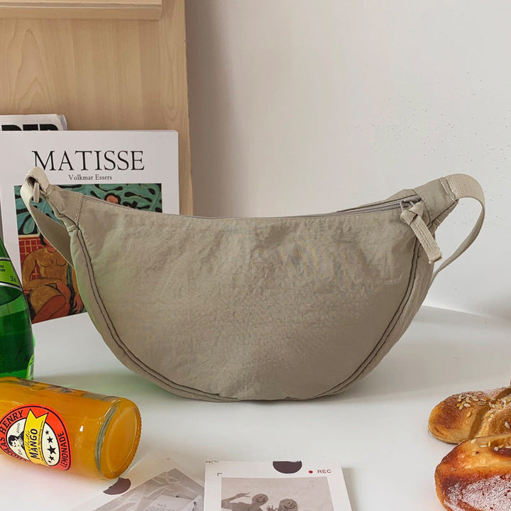 Fashionable Half Moon Shoulder Bag, a must-have women's purse for everyday style.