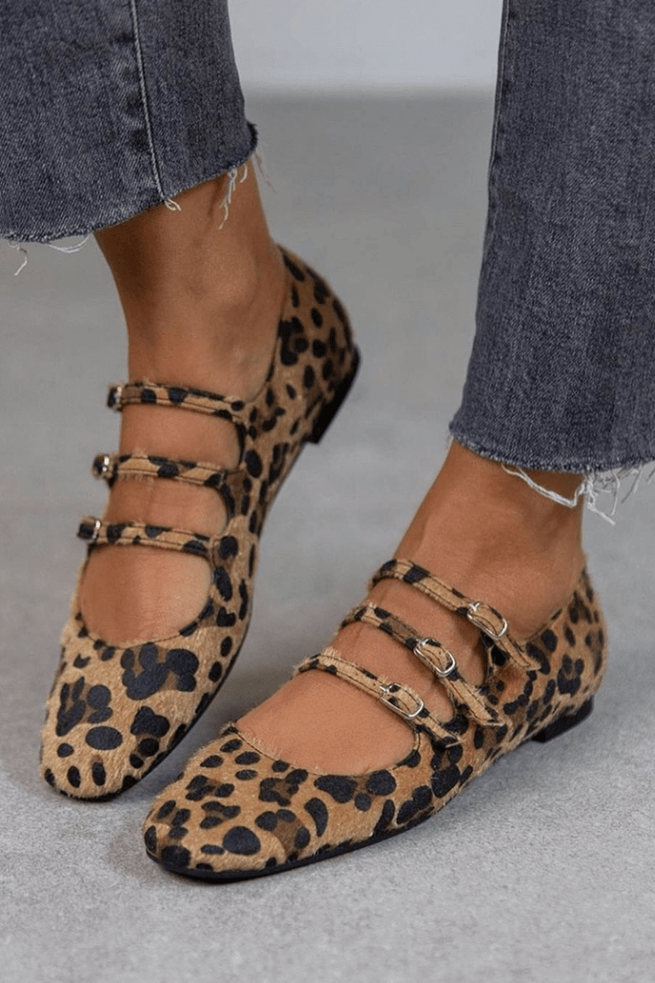 Stylish women's animal print ballet flats featuring a secure triple strap design. Ideal comfortable casual shoes.