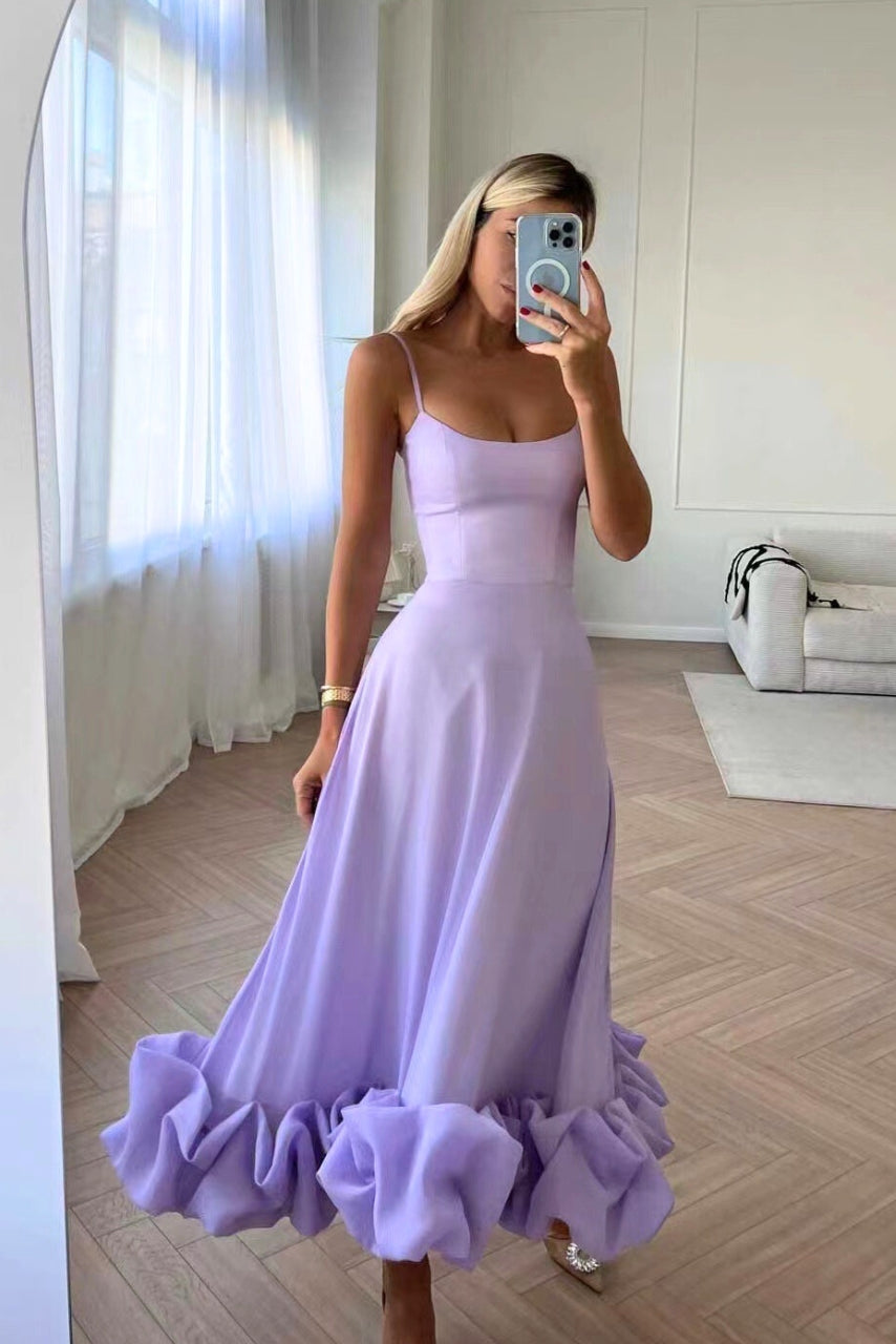 Detail of elegant women's midi dress neckline, a chic and formal choice for wedding guests and special occasions.