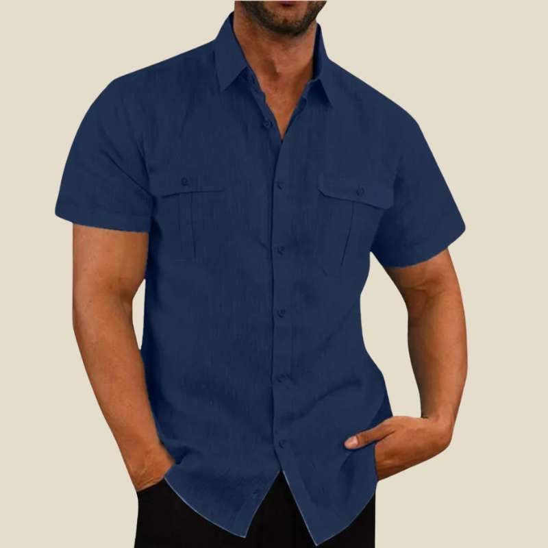 Close-up of a men's relaxed fit short-sleeve button-down shirt, showing dual chest pockets and casual style.